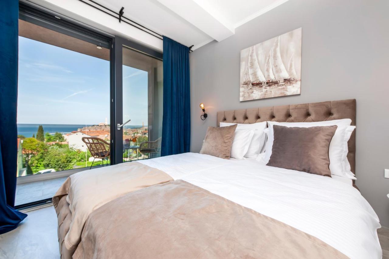 Deluxe tweepersoonskamer met balkon en uitzicht op zee